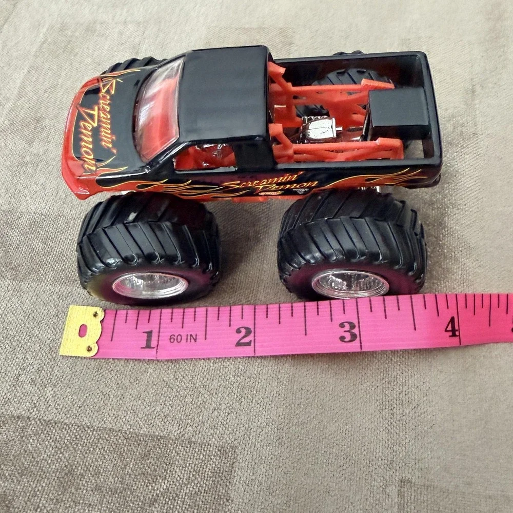 VTG 2006 Hot Wheels Screamin' Demon 1:64 Monster Jam Truck Toy Black Red Flames